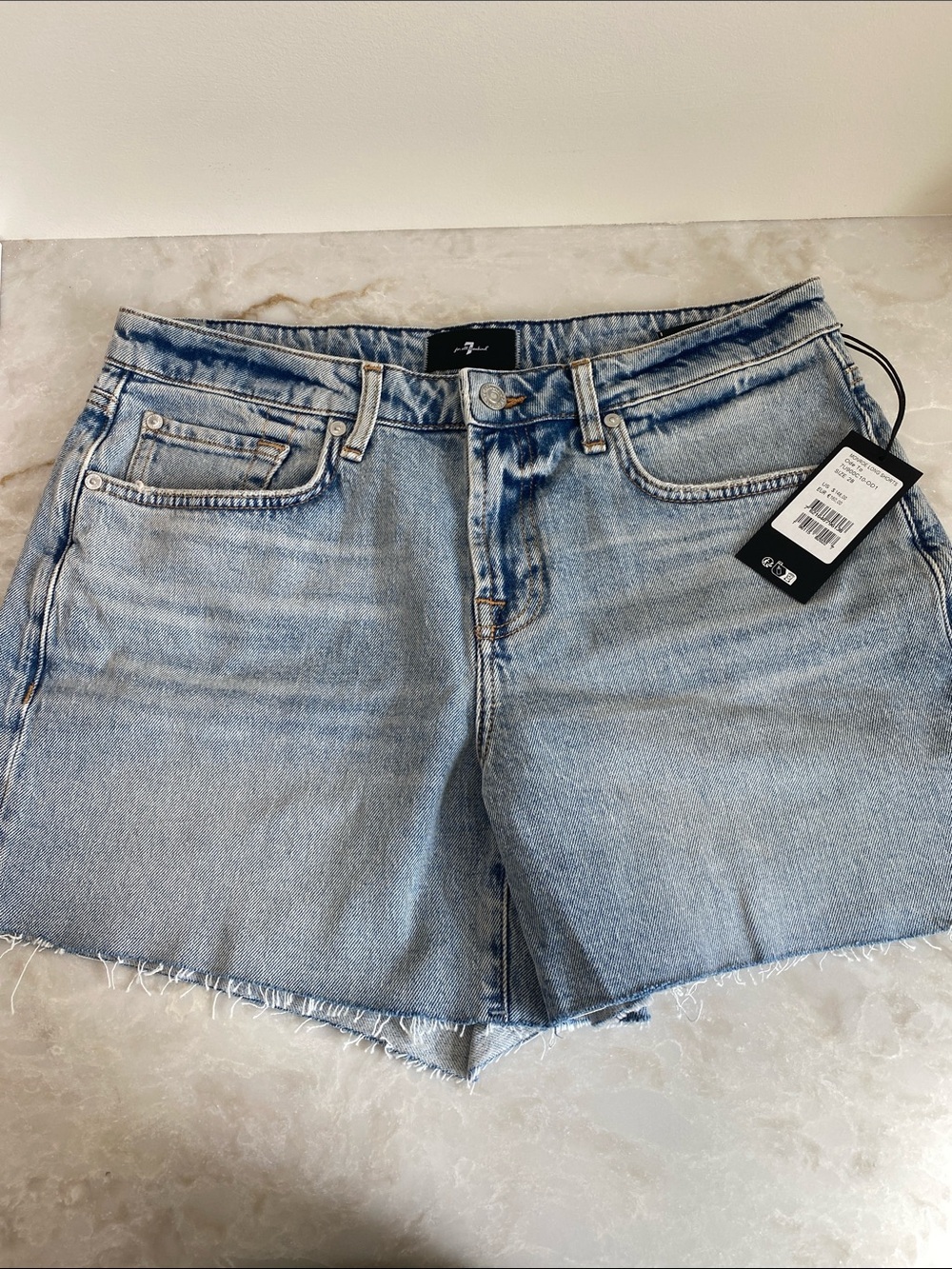 7 For All Mankind Light Blue Denim Cutoff Shorts with Raw Hem